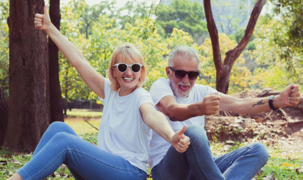 happy older couple in the park