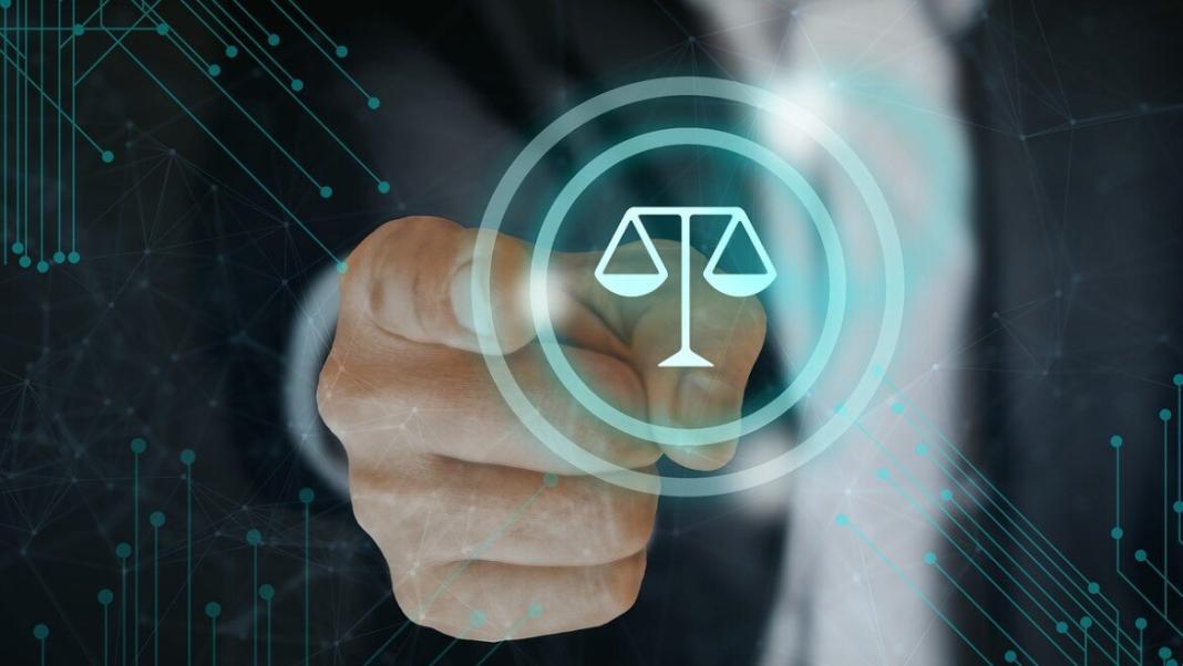 a justice balance symbol with a lawyer in the background pointing his finger