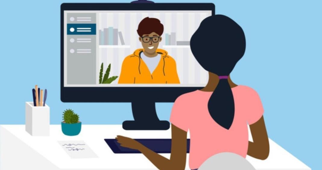 a lady giving interview to another person on the desktop as part of hiring process