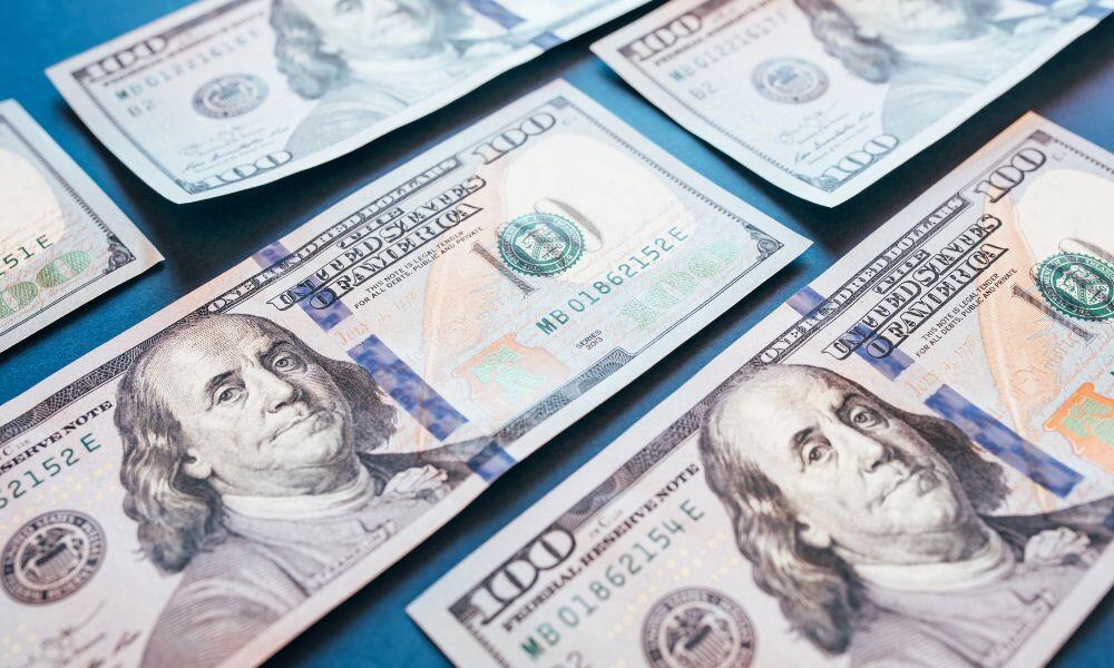 dollar currency depicting Smart Ways To Spend Your Tax Refund This Year