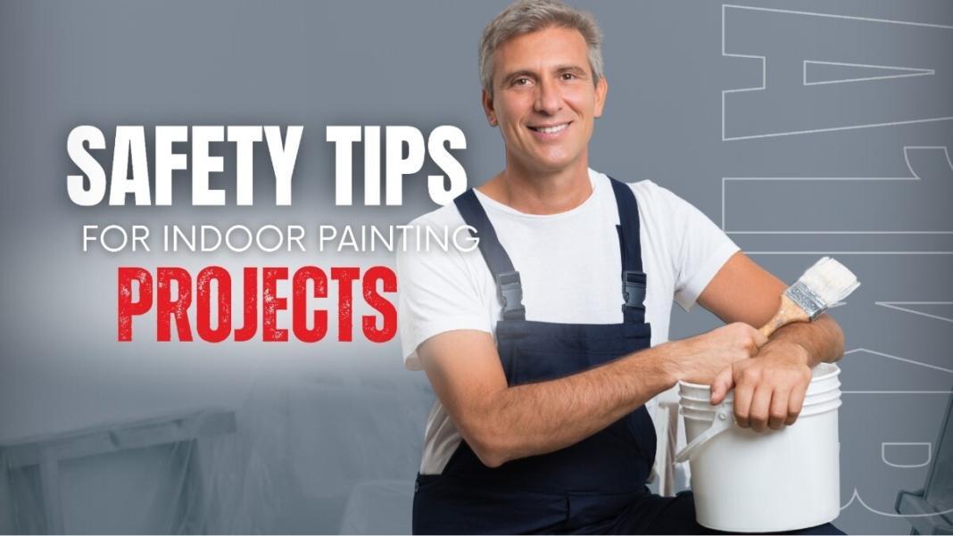 a man holding a bucket of paint highlight the safety tips for indoor painting