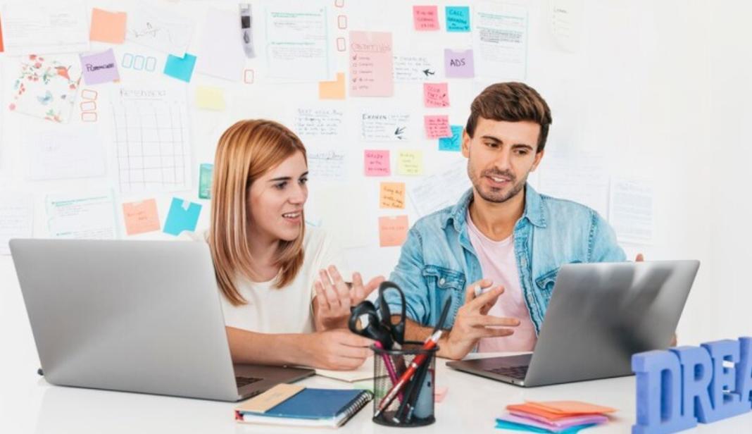 two persons discussing on the advantages of digital marketing