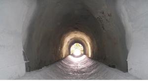 a drainage hole with light on the other end of the passage