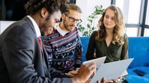 three people discussing each other on the business loan for opportunities