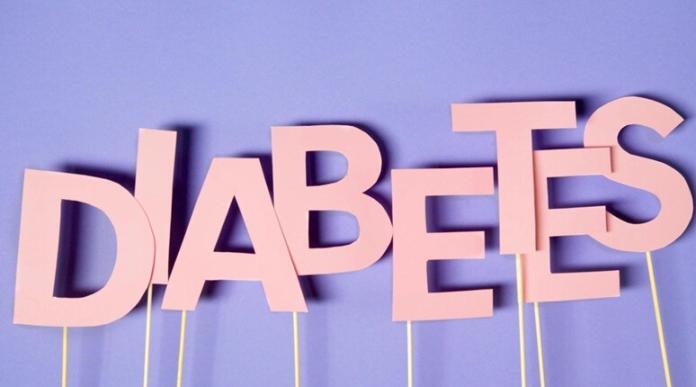 diabetes word written in pink color on a blue background
