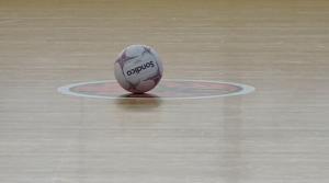 a netball lying on the playing court