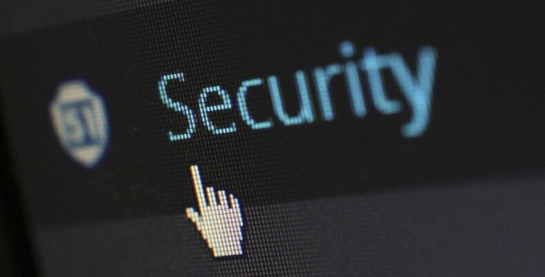 security written on a black background with a hand icon pointing