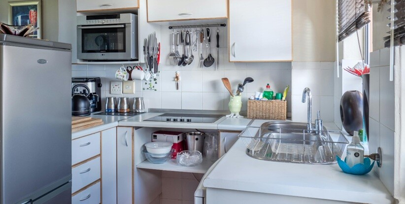 kitchen appliances with oven and refrigerator