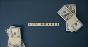 US dollar currency seen with the letter businesses written in the center