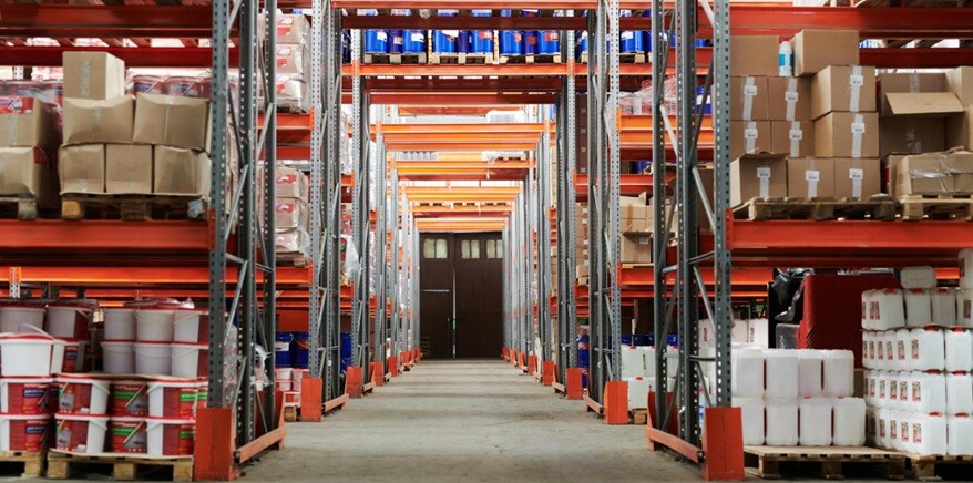a warehouse with a lot of inventory stored in racks