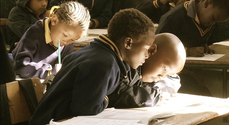 African students group of African students studying with books on a table