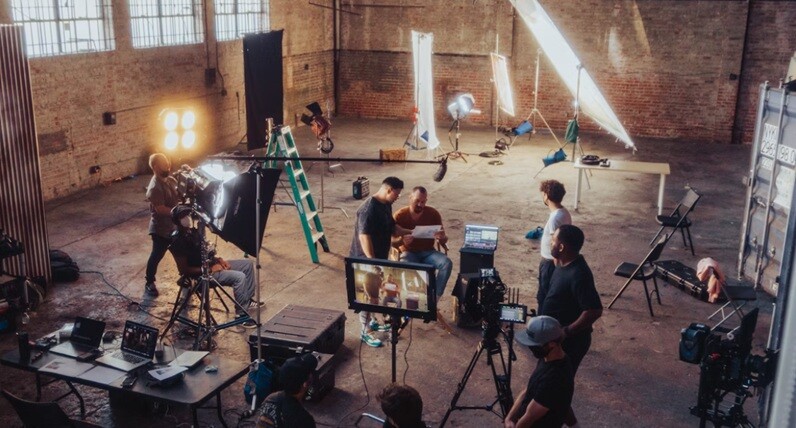 writers a group of creative people working in a set with the actors and directors of the movie