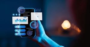 a person holding a mobile with modern AI apps shown in it