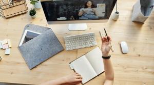 a student attending online tutoring session using a desktop