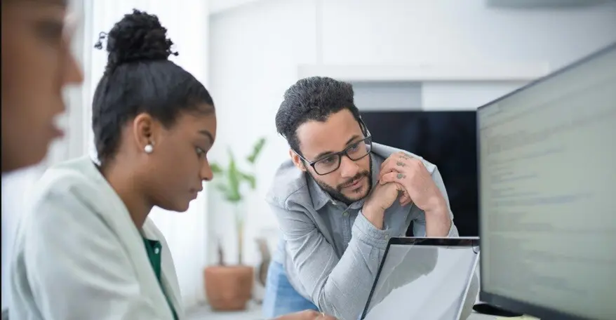 recruiters working on laptop screening for profiles for software engineers