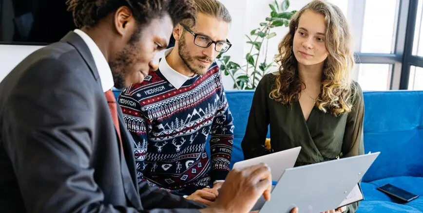two man and a lady discussing on software development services