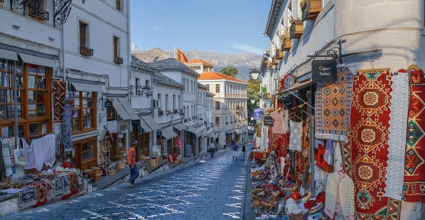 Albania road view seen with shops on either side