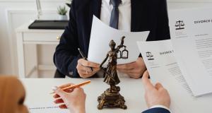 a lawyer discussing with his clients on a legal matter