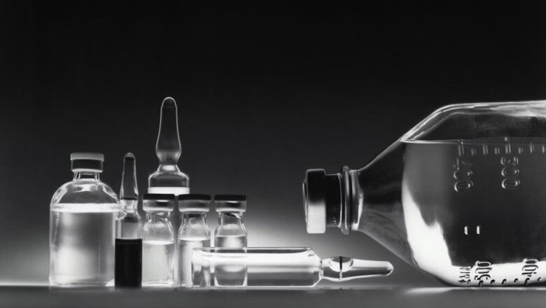 pharmaceutical bottles placed on a table in black and white background