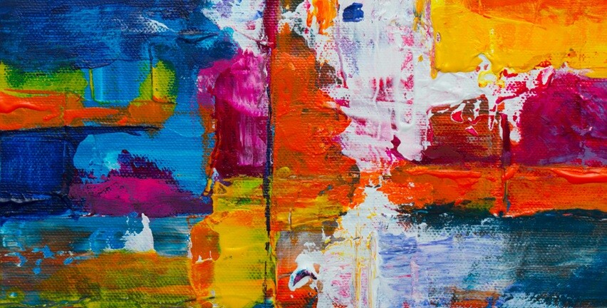 a photo with mix of colors painted on a board