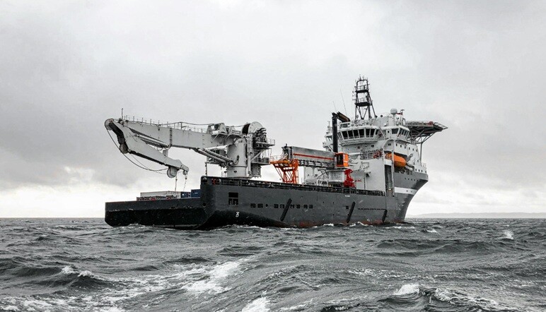 warship a marine ship sailing on the ocean with grey clouds