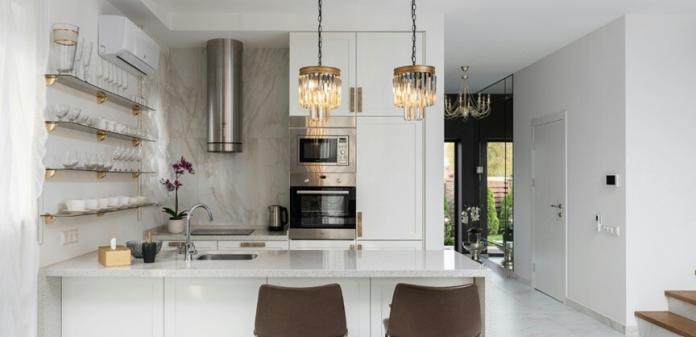 home with oven, air conditioner and other appliances are seen