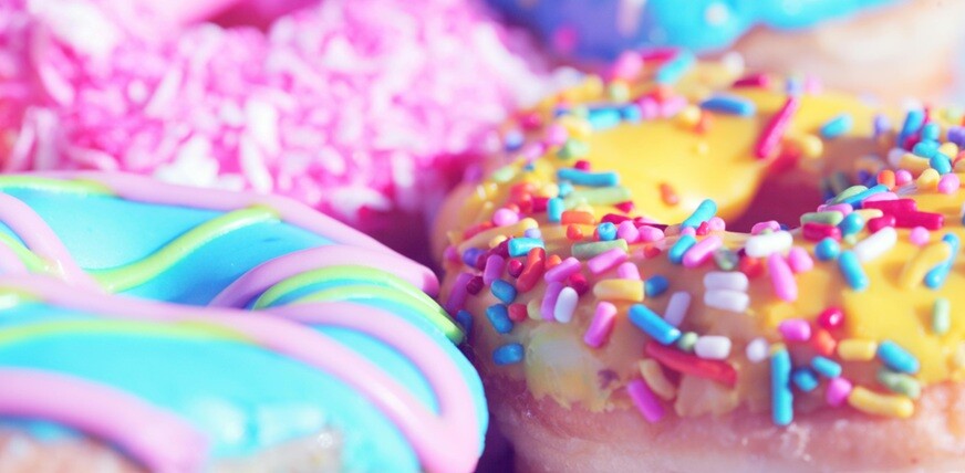 colorful donuts in pink, blue, yellow shades looking bright