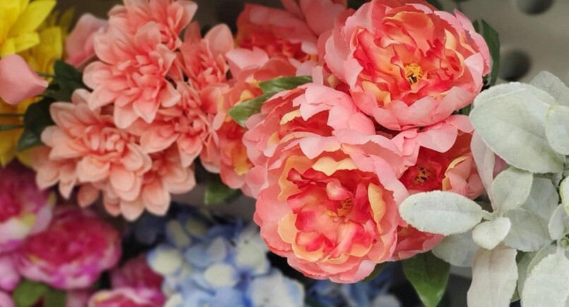 flowers a bunch of colorful faux flowers grouped together