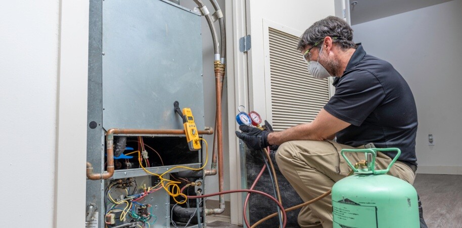 a person working on an electrical wiring with electronic devices