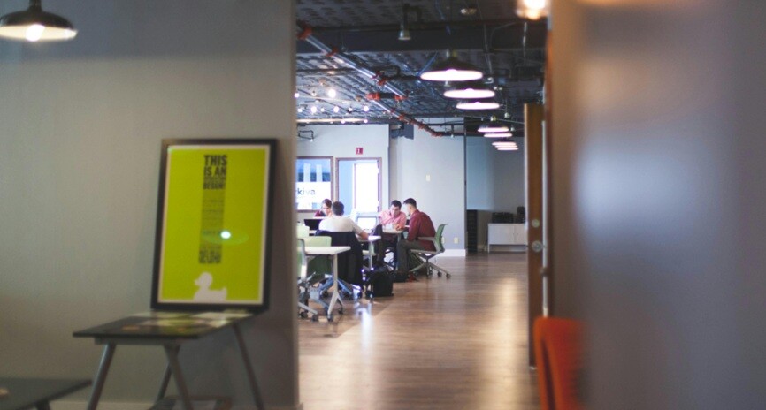 office mold an office space where a group of people are working with lights on