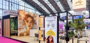 trade show exhibits with lady on the frames in a hall