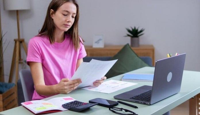 Financial planning and loan comparison on a clean workspace, illustrating how better installment loan lenders can help avoid bad credit secured loans and improve credit health