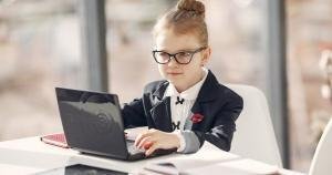 Young entrepreneur using a laptop while developing business ideas and digital skills
